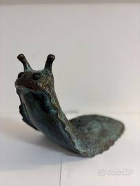 Rara lampada a forma di lumaca in bronzo