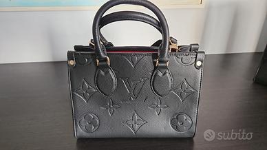 borsa con manici e tracolla 