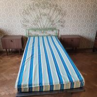 letto con testiera in ferro battuto