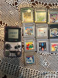 Game boy color atomic purple e lotto 21 giochi