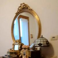 specchio in foglia d'oro