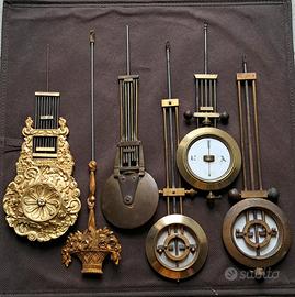 orologio antico pendolini
