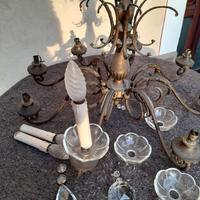 Lampadario 8 bracci in ferro battuto e cristallo