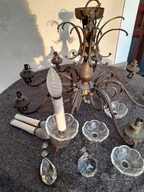 Lampadario 8 bracci in ferro battuto e cristallo