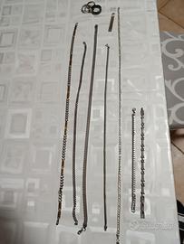 Collane, bracciali, anelli, e ferma banconota 