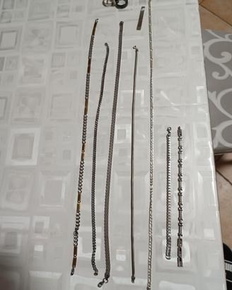 Collane, bracciali, anelli, e ferma banconota 