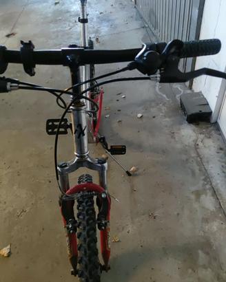 Bicicletta uomo sospensioni doppia cavalletto
