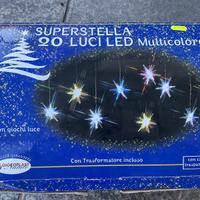 Luci natalizie multicolore a forma di stella
