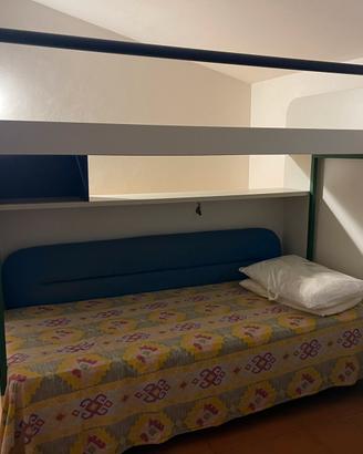 Letto a soppalco in legno massello