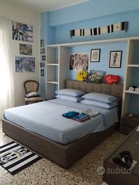 letto a scomparsa con contenitore