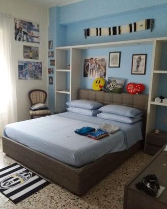 letto a scomparsa con contenitore