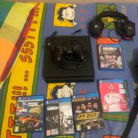 PlayStation 4 slim con giochi e cuffie