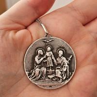 medaglia religiosa bifacciale in argento