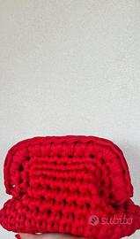 Clutch bag di colore rosso