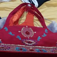 Borse in seta e paillettes