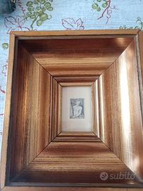 Miniatura cornice dorata