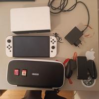 Switch OLED + accessori originali + 2 Giochi