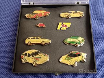 Set di 8 spillette/pins automobili Lancia