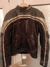 giacca e pantaloni Dainese e cavalletto moto