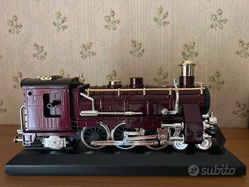 Locomotiva con orologio