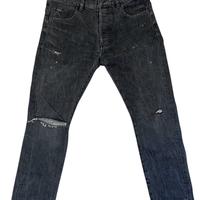 Jeans skinny grigi strappati