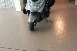 Burgman 125. Appena tagliando.  