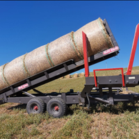 Carrello autocaricante per rotoballe