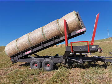 Carrello autocaricante per rotoballe