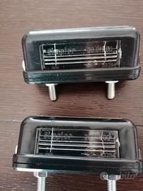 Fanali HELLA luce targa
