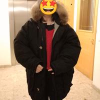 Piumino con cappuccio in pelliccia vera