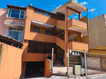 Trilocale con cortile e garage