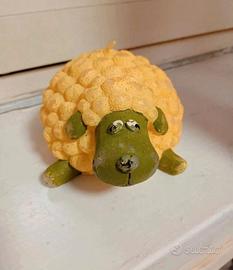 candela a forma di pecorella 