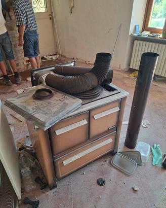 putagé a legna con forno
