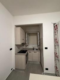 Cucina angolo cottura con forno e induzione