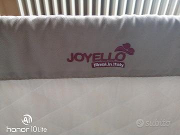 lettino bimbo vicino letto