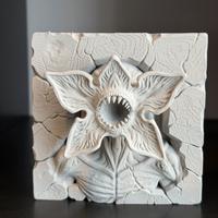 Demogorgone che emerge dal muro Stranger Things