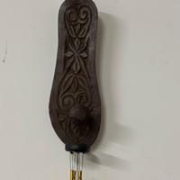 Scacciapensieri in legno decorato