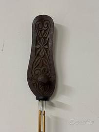 Scacciapensieri in legno decorato