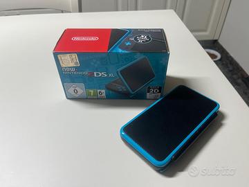 Nintendo 2DS XL Nero/Azzurro FULL SET + 9 Giochi