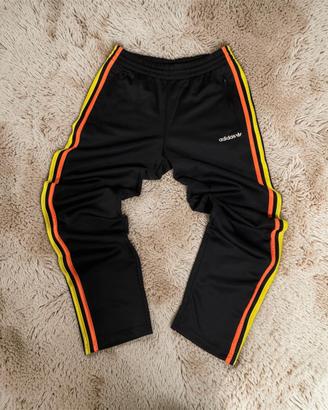 Tuta adidas nera acetata nuova taglia L da bimbo