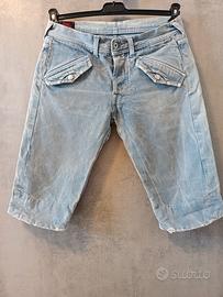 pantaloni corti jeans marca Evisu 