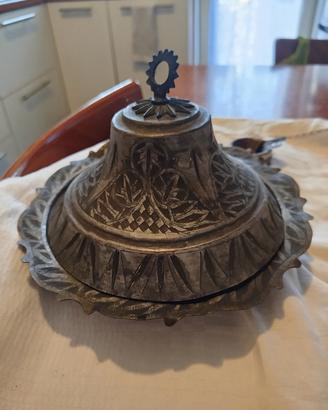 svutatasche in peltro e metro in acciaio