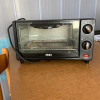 Comodo fornetto scalda vivande .