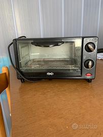 Comodo fornetto scalda vivande .