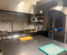 Bar con cucina