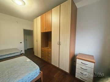 Camera da letto con 2 letti da 1 piazza e 1/