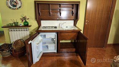 Madia in noce massello con cucina a scomparsa