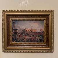 Quadro con cornice dorata