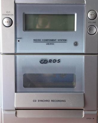 Stereo JVC - radio cd cassette con case