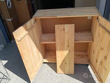 mobile in legno grezzo con due ante